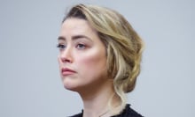Actress Amber Heard looks solemnly ahead at the defamation trial Heard vs. Depp.