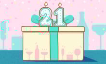 cake shaped like a present with the number 21 on top