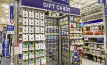 A store displays gift cards for purchase.