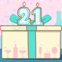 cake shaped like a present with the number 21 on top