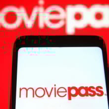 MoviePass logo and phone on red background