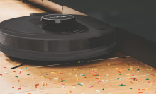 Shark AI ultra robot vacuum vacuuming colorful sprinkles