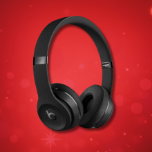 beats solo3 headphones against a red background